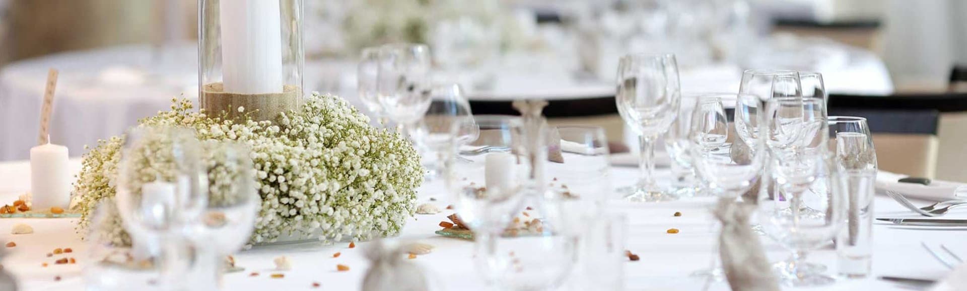 An outdoor wedding ceremony in the gardens at Castle Bromwich Hall Hotel